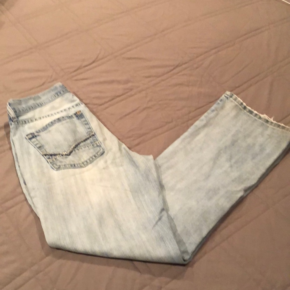 The Buckle Reclaim low rise boot cut distressed Jeans Size 30x32